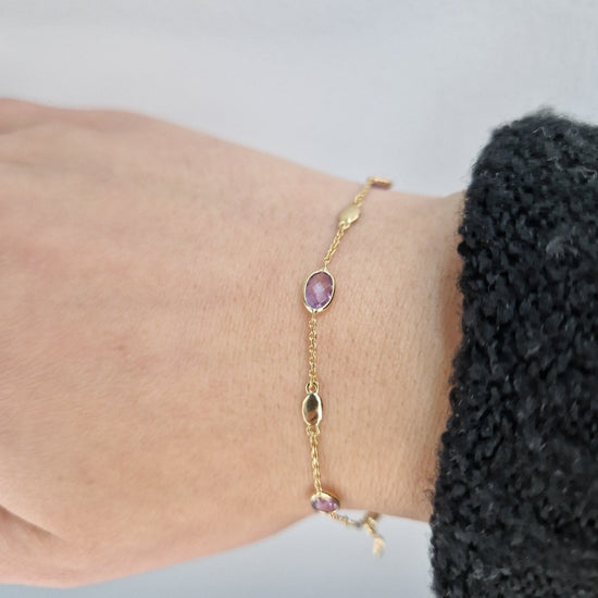 Armband med ovala ametister lila stenar i 18k guld