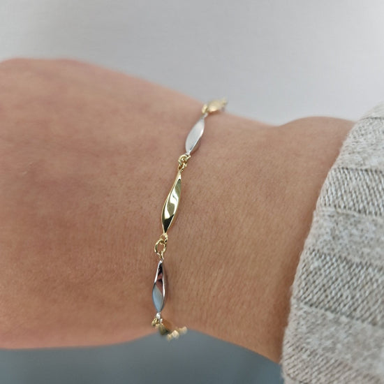 Armband oval design i tvåfärgat 18k guld