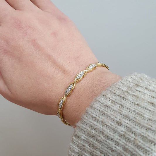 Armband oval design i 18k guld