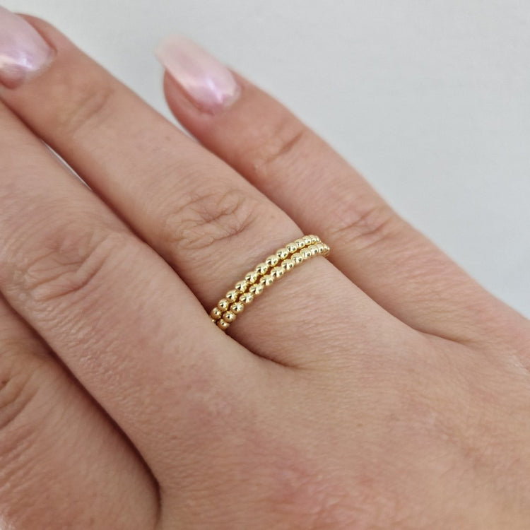 Ring modell kulor 18k guld